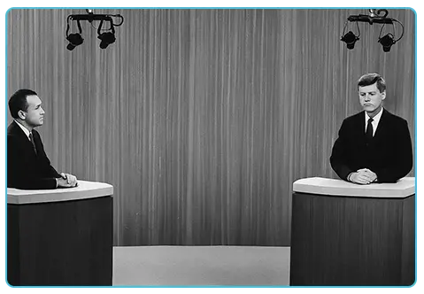 A black and white photo from the pioneering Kennedy Nixon televised debate. first televised presidential debate, 1960